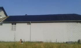 Metal tile roofing