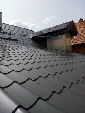 Metal tile roofing